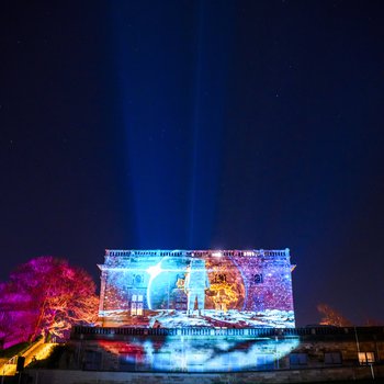 Purple light projections against Nottingham Castle
