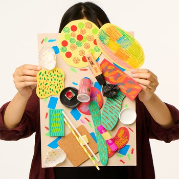 A person holding up a collage picture