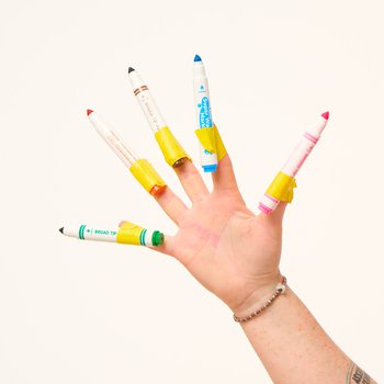 A hand with pens attached with tape to all the fingers