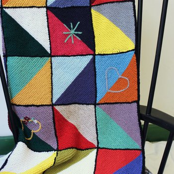 Care Sqaures knitted patchwork blanket