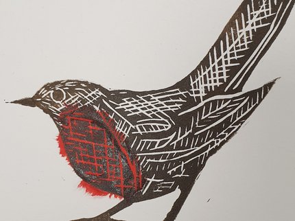 Lino print of Robin in brown and red ink