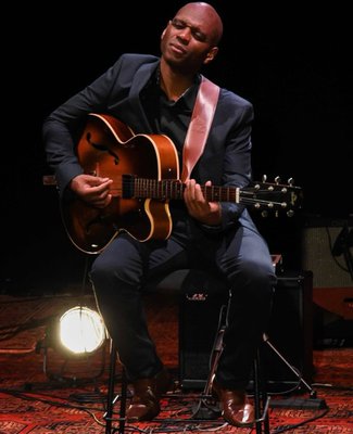 Photo of jazz guitarist Edison Herbert in performance