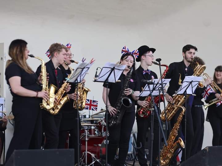 Red Hot Band performing on stage at Berry Hill Park Mansfield
