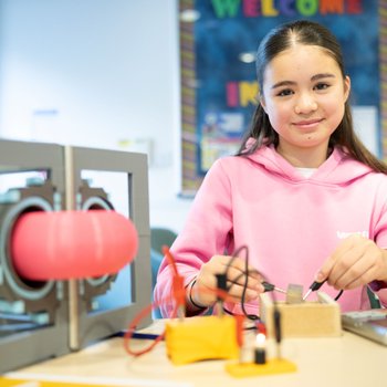 girl using scientific equipment