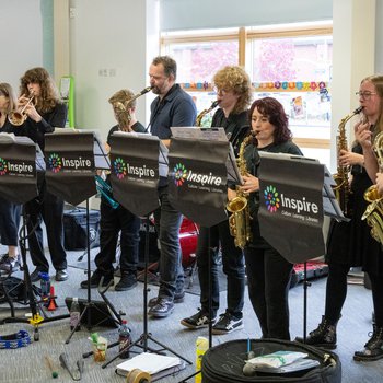 Inspire band playing their instruments