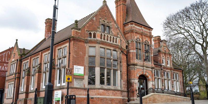 Hucknall library building which is a red brick building with a tower porch