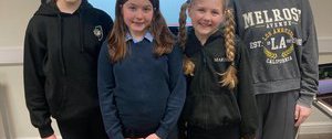 A group of four young singers