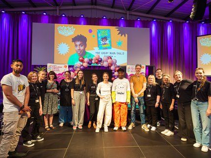 A group of people on stage