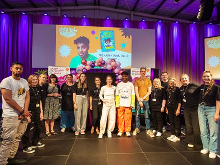 A group of people on stage
