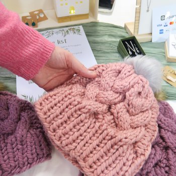 Knitted hats at a market