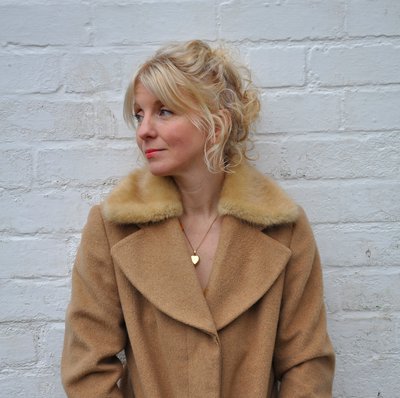Poet Liz Berry- a woman with light coloured hair, wearing a coat