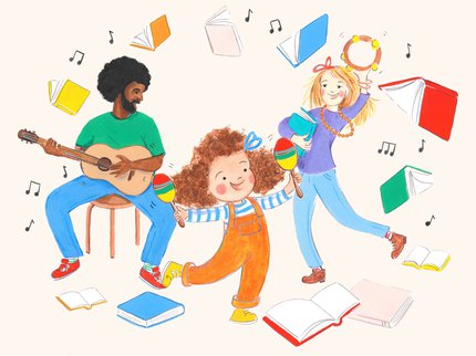 Luna wears orange dunagrees and her parents dance and play instruments
