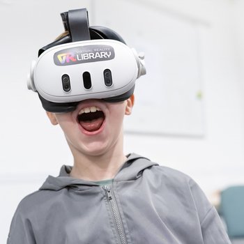Boy using virtual reality headset