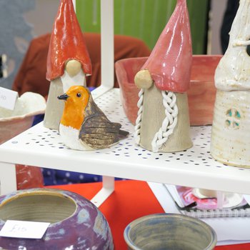 Pottery including decorations and plates on sale at a Christmas market