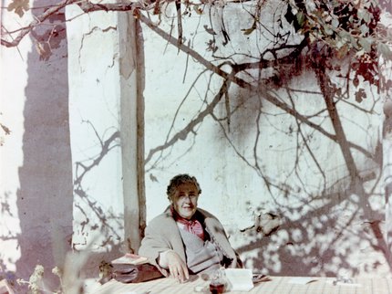 A photograph of Agatha Christie relaxing during a sightseeing tour, Tajoura, Libya, 1955. © The Christie Archive Trust