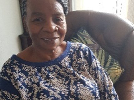 Rosetta Burrel sitting in armchair