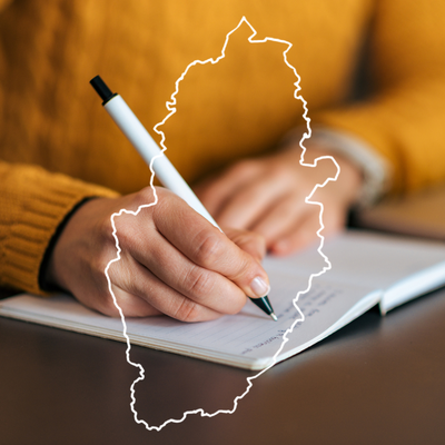 Person writing, with the outline of Nottinghamshire county overlapping