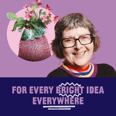 Smiling lady with glasses on a purple background with an idea bubble containing a plant