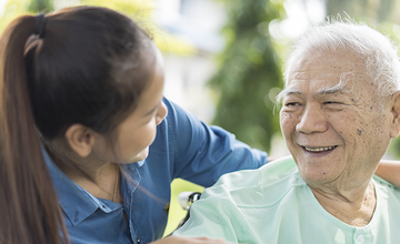 A carer and elderly man