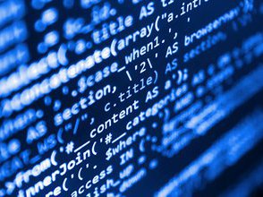 Black computer screen with blue coding text