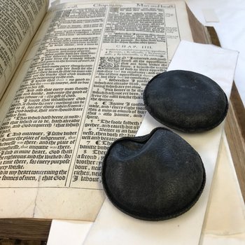 Example of during a paper repair, with blotter packs holding the paper flat