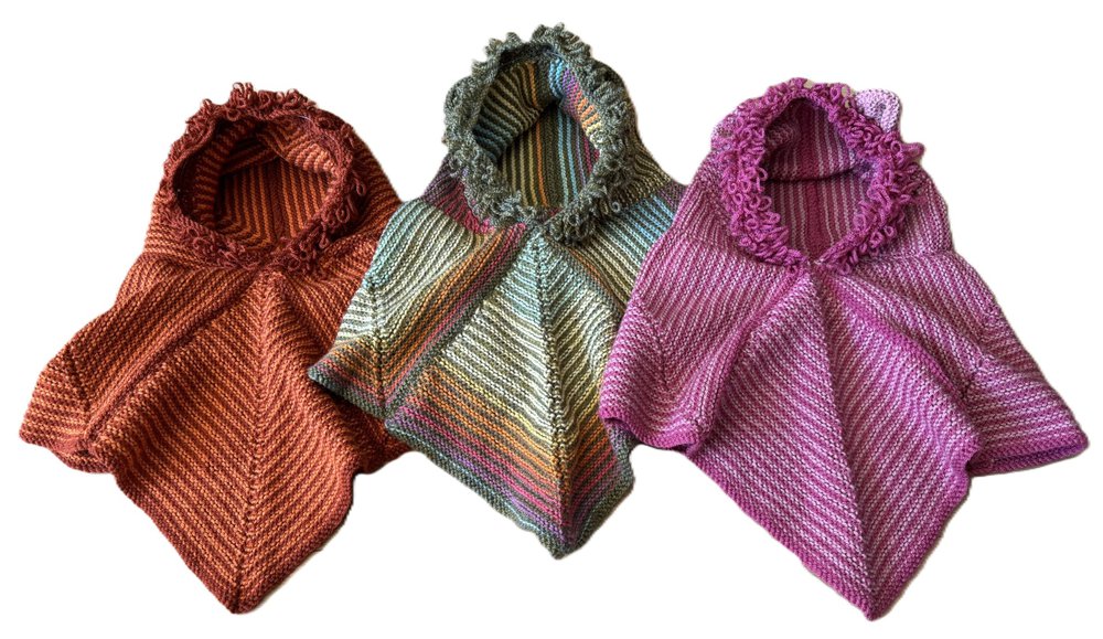 Photo of 3 knitted Story Snugglers