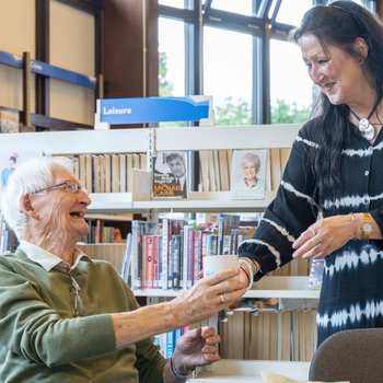 people at a places of welcome session in the library