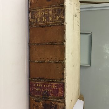 Before spine repair, showing the worn leather