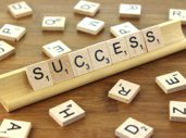 Letter tiles spelling the word success
